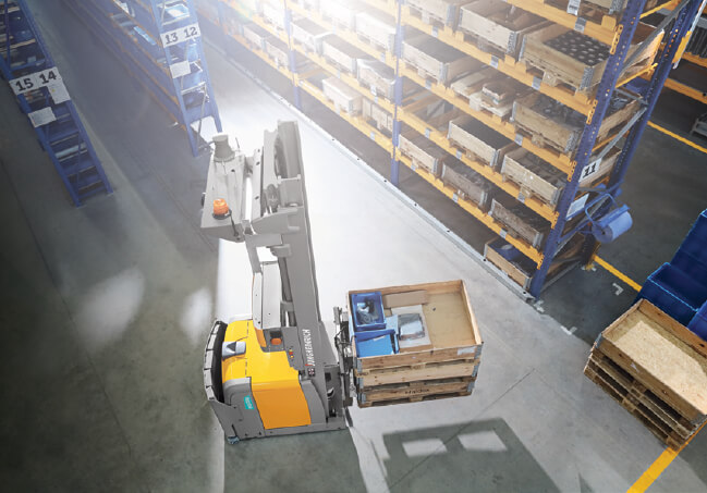 EKS 215a automated stacker operating in warehouse